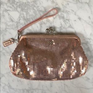 NWOT Coach kisslock sequin clutch rose gold